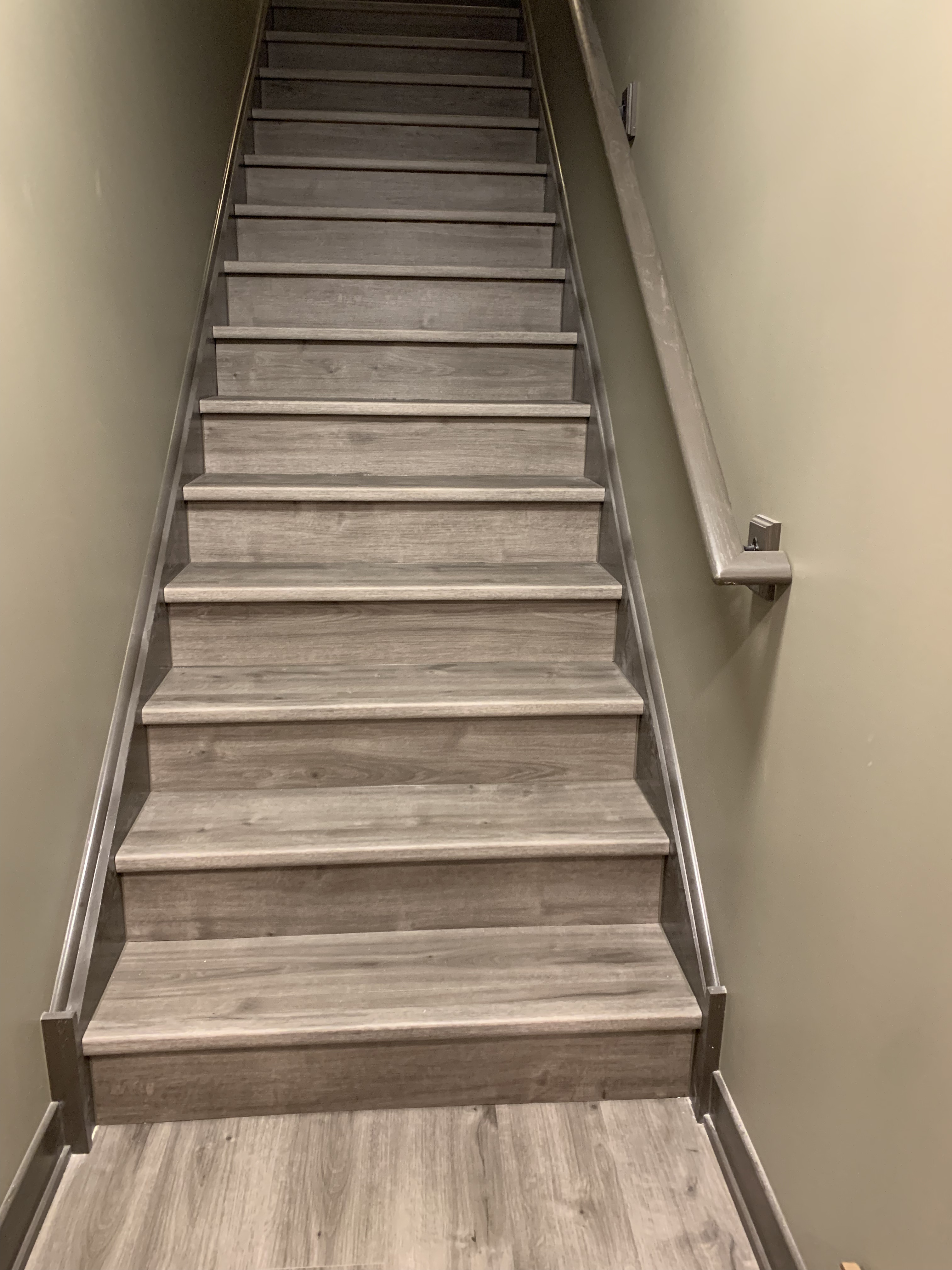 Gray vinyl stair treads installation